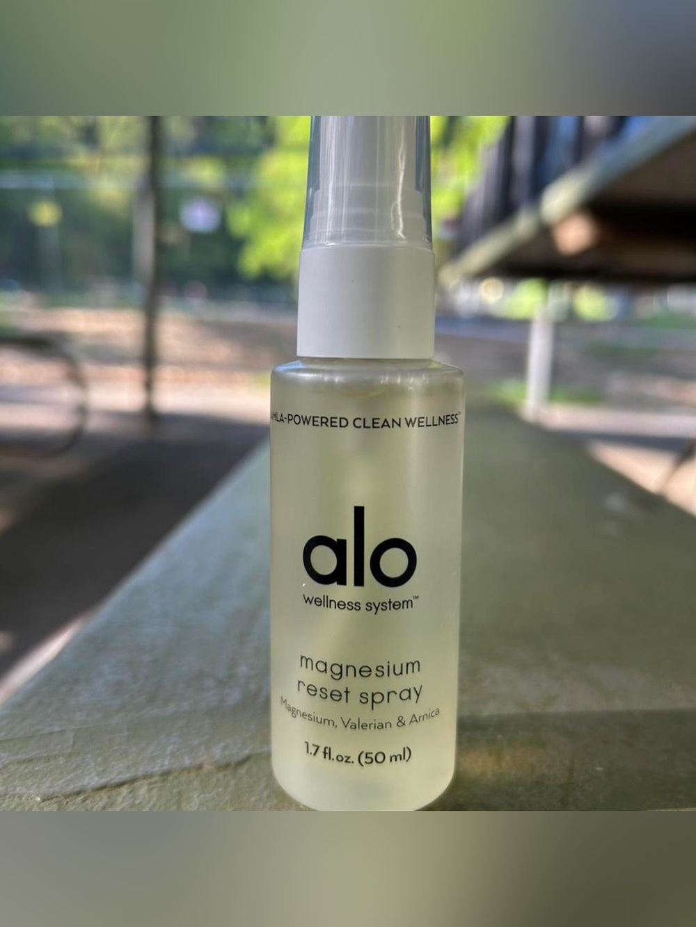 ALO Yoga Magnesium Reset Spray - Clear Bottle with White Cap and Frosted Body